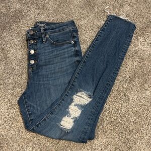 Women's Blue Distressed high rise skinny Jean size 4 and they stretch